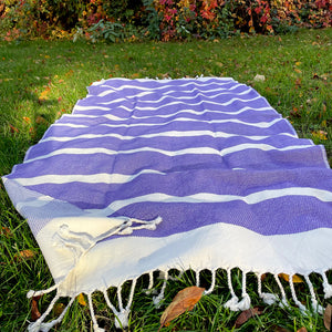 Strandtuch lila gestreift